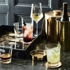 Antique Brass Hammered Coasters with Holder, Set of 4 -TABLETOP BAR STORE antique brass hammered coasters with holder 202240 0042 antique brass hammered coasters with holder set of 4 z